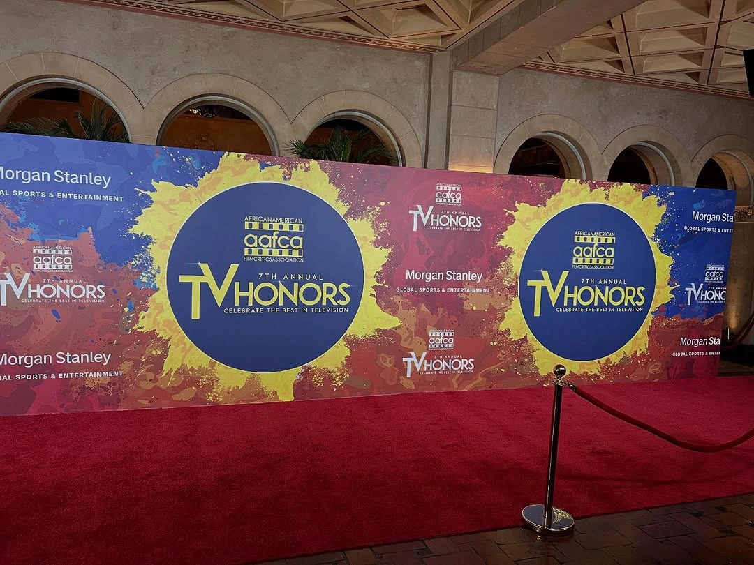 Press conference backdrop with multiple sponsor logos for product launch event